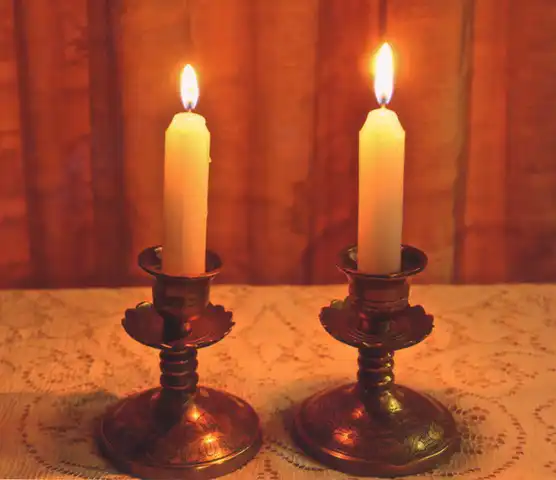 Candlesticks with lit candles